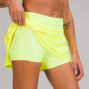 Lululemon pace rival mid rise skirt. Highlight yellow.